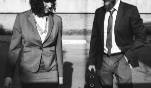 man and women in suits